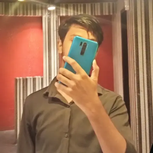 The author photographing a mirror